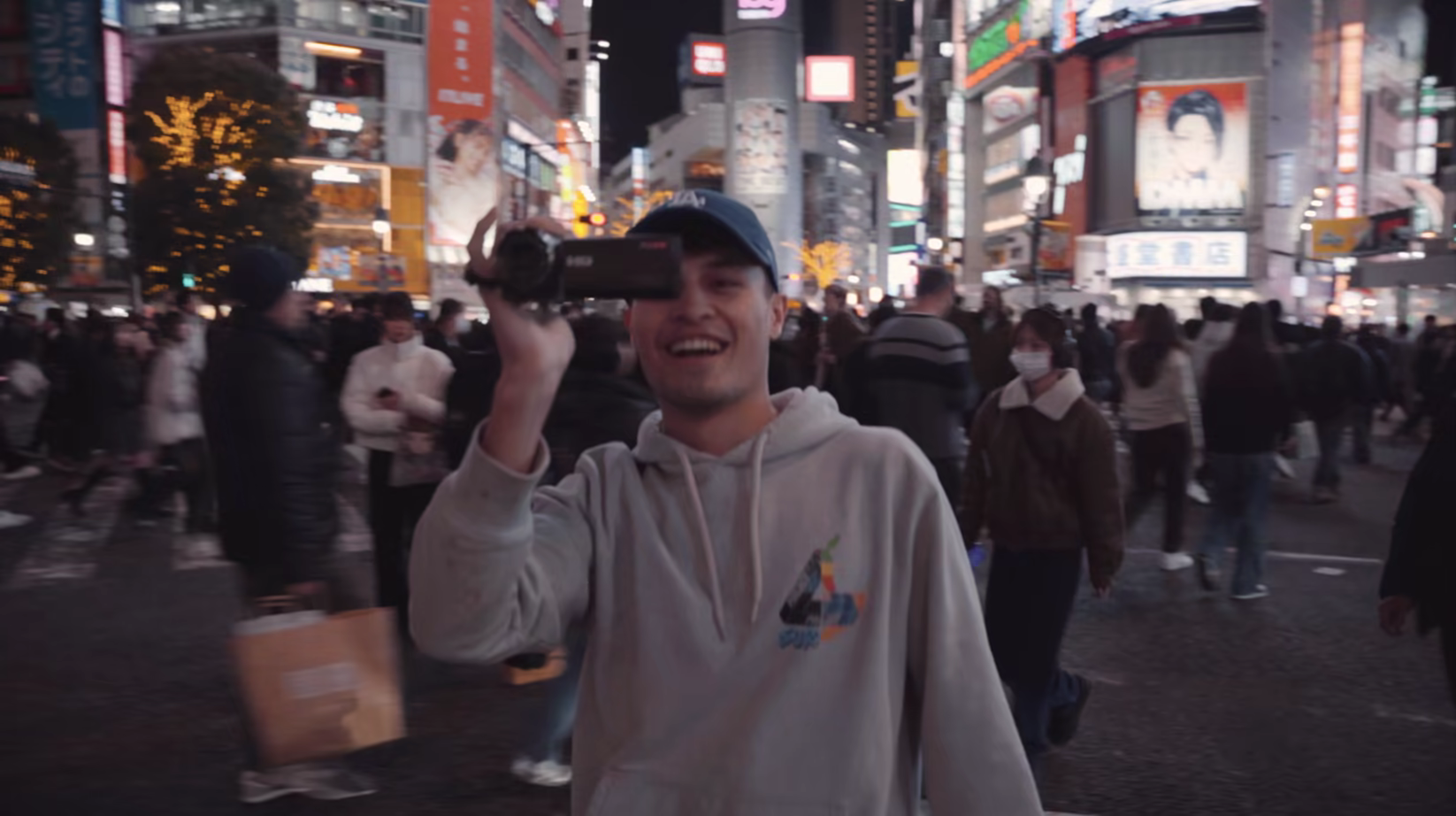 Filming in a Tokyo crowd at night