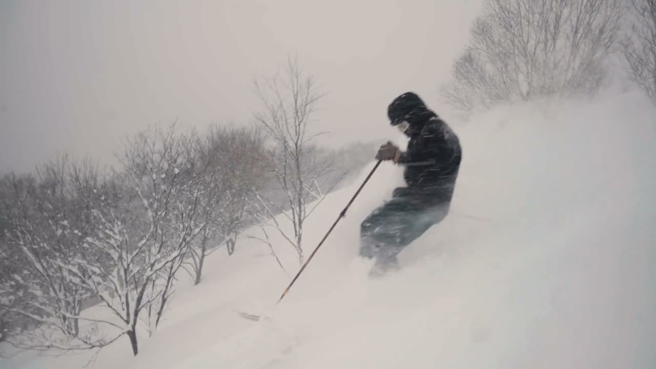 Skier turning through fresh snow