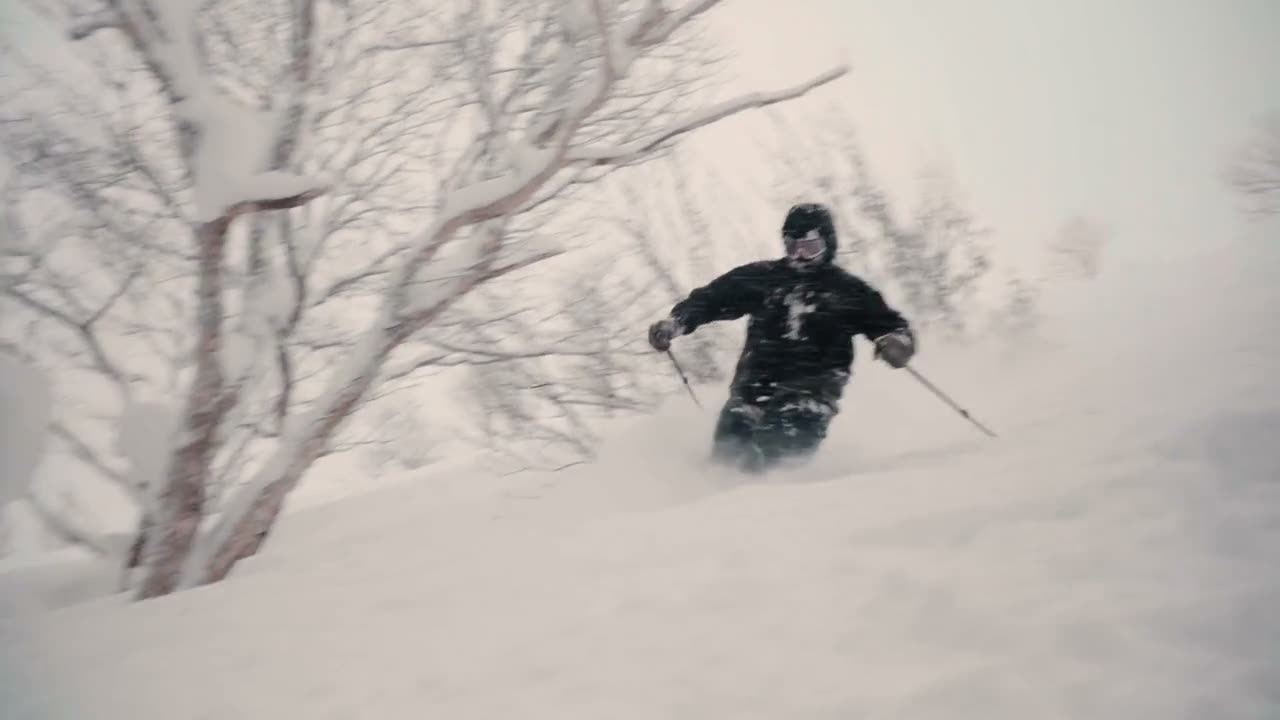 Two riders celebrating at the lift