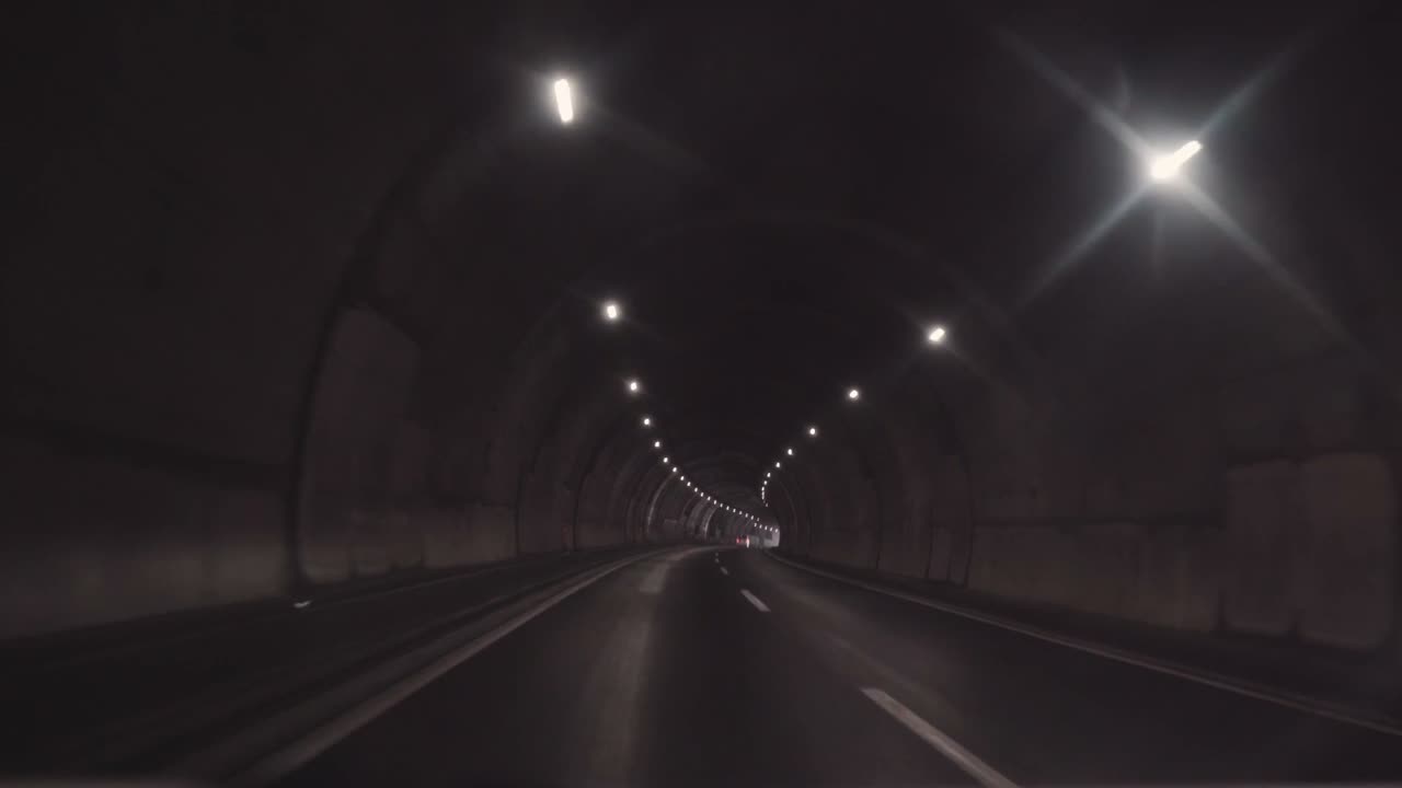 Travel through a lit tunnel