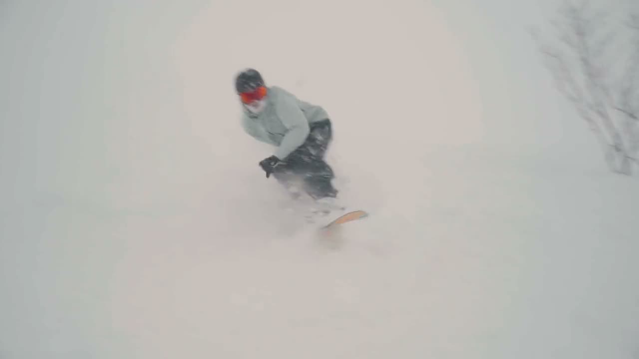 Snowboarder in a whiteout