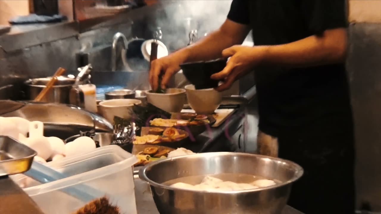 Filming on a Tokyo street at night